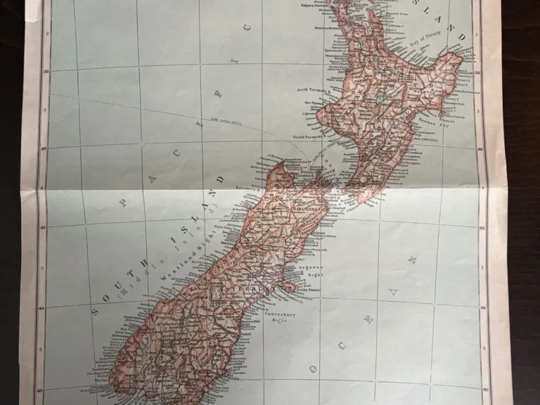 New Zealand plate from a Britannica atlas, with county names, latitude and longitude grid, scale and key visible