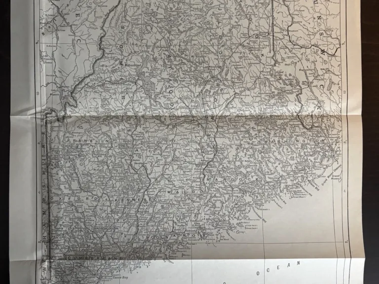 A circa 1911 Britannica map of Maine showing county boundaries, railways, the Atlantic coast and neighbouring Quebec and New Brunswick