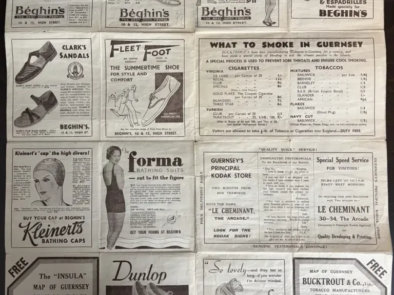 Reverse of a 1934 Guernsey visitor map arranged as fifteen illustrated local advertisements