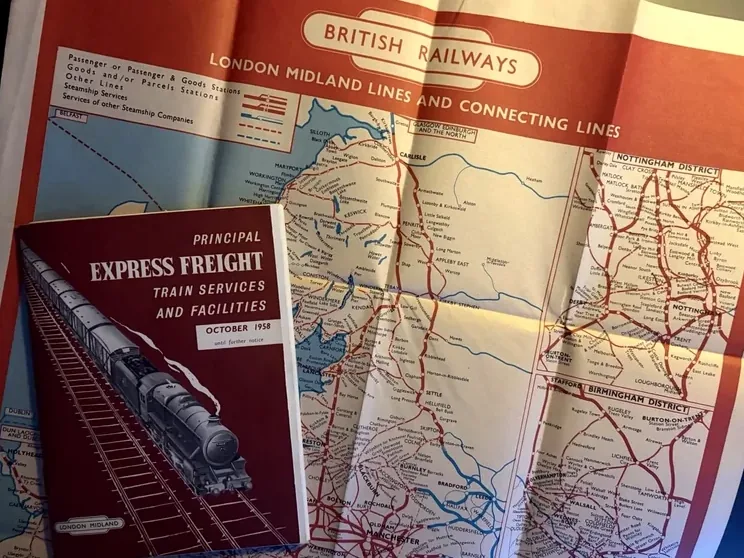 British Railways express freight booklet laid over a London Midland fold-out route map