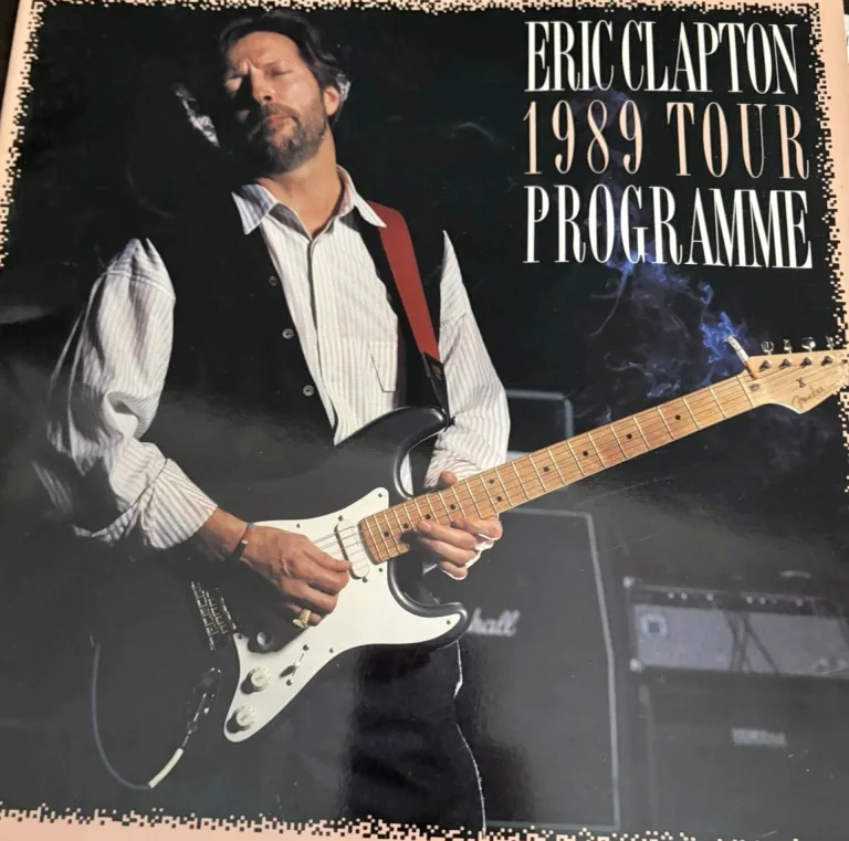 Black cover of the Eric Clapton 1989 Tour Programme, showing Clapton holding an electric guitar