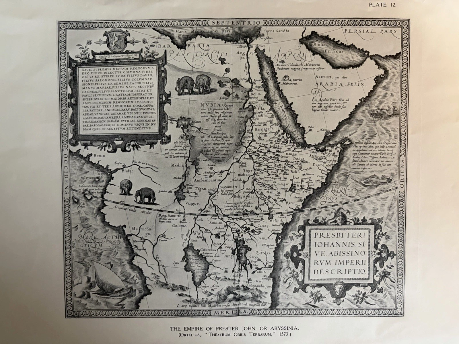 Monochrome reproduction of Ortelius's map of the kingdom of Prester John in north-east Africa, with cartouches, animals, a ship and a sea creature.