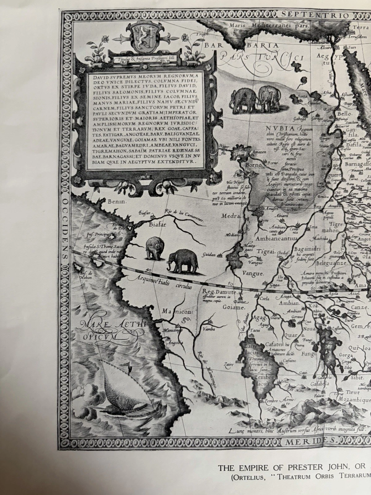 Left portion of the Prester John reproduction with a large Latin cartouche, elephants, mountains, western coastline and a sailing ship.