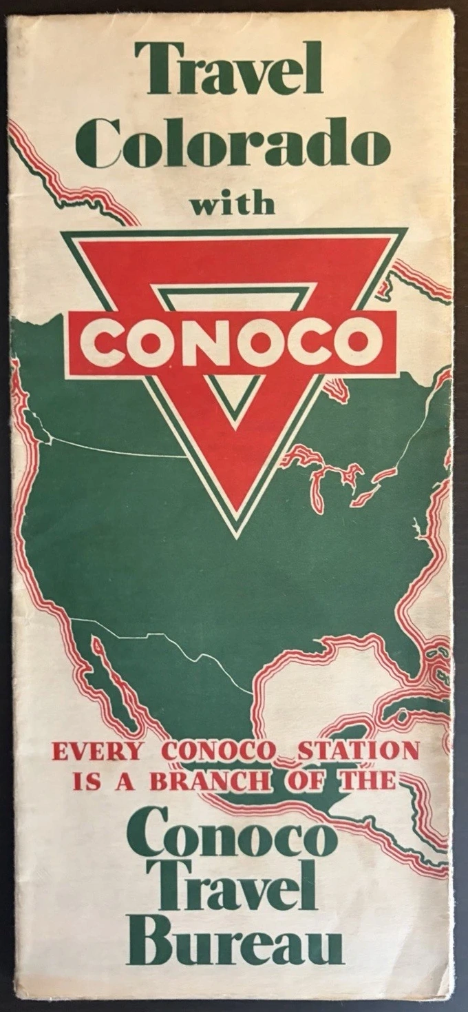 Folded Travel Colorado road map cover with a large red Conoco triangle over a green outline of North America.