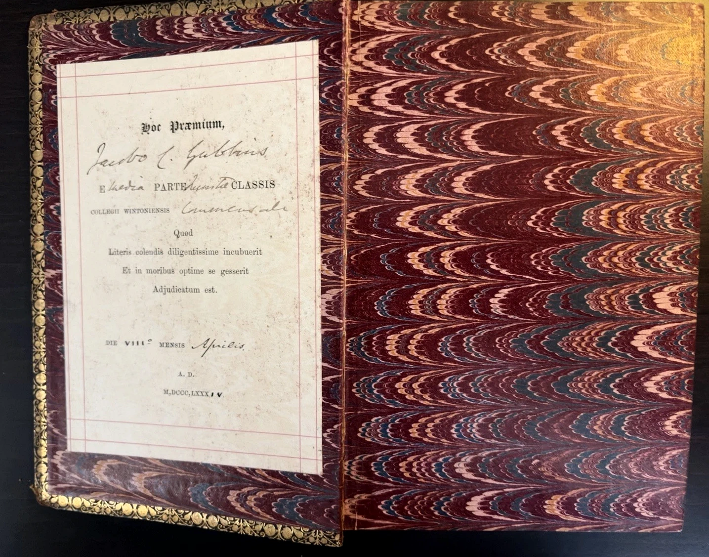 Winchester College prize label and marbled endpapers