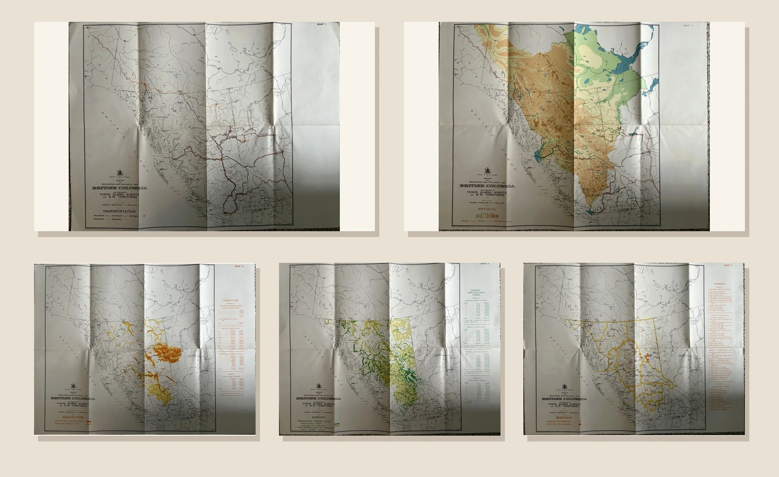 Five folded British Columbia maps dated 1947 arranged in numbered order, coloured for transportation, physical geography, agriculture, forests and minerals.