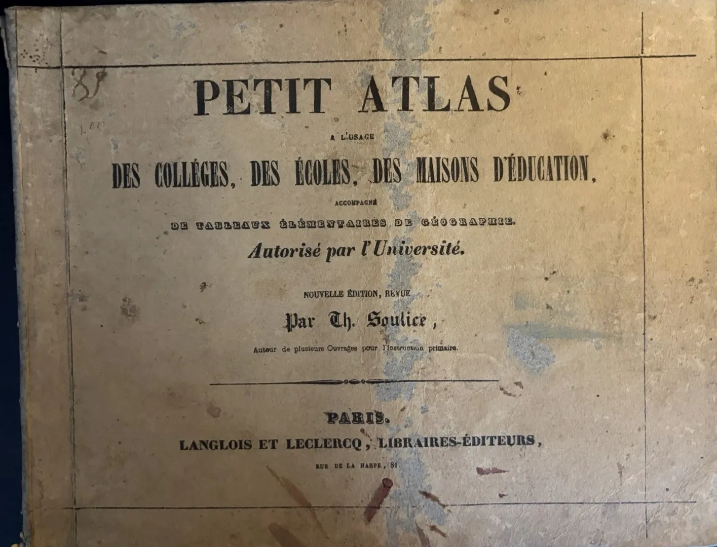 Worn printed boards of a small French Petit Atlas