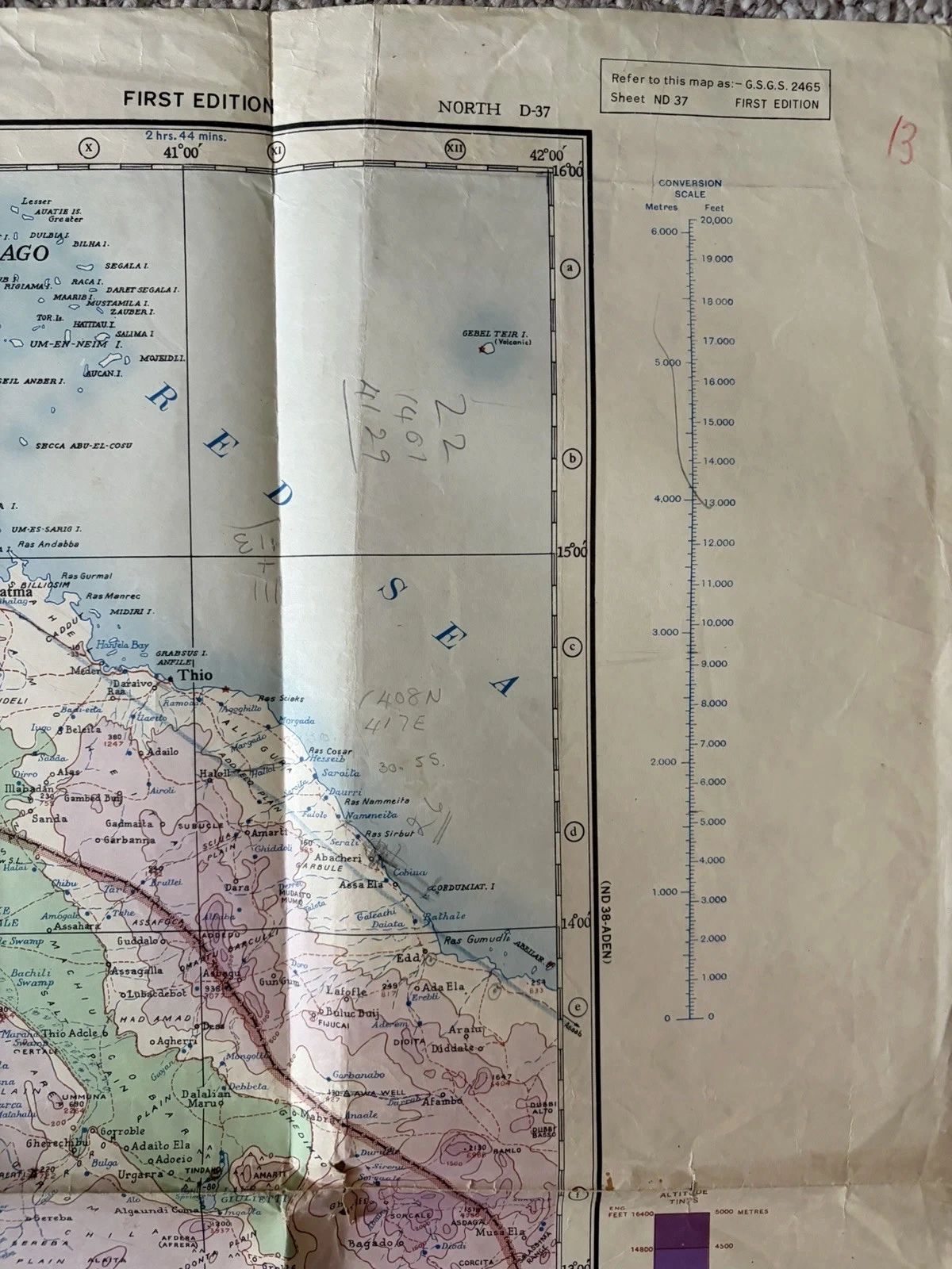 Right edge of the Asmara map showing the GSGS 2465 sheet box, conversion scale, a red handwritten 13 and pencilled figures across the Red Sea.