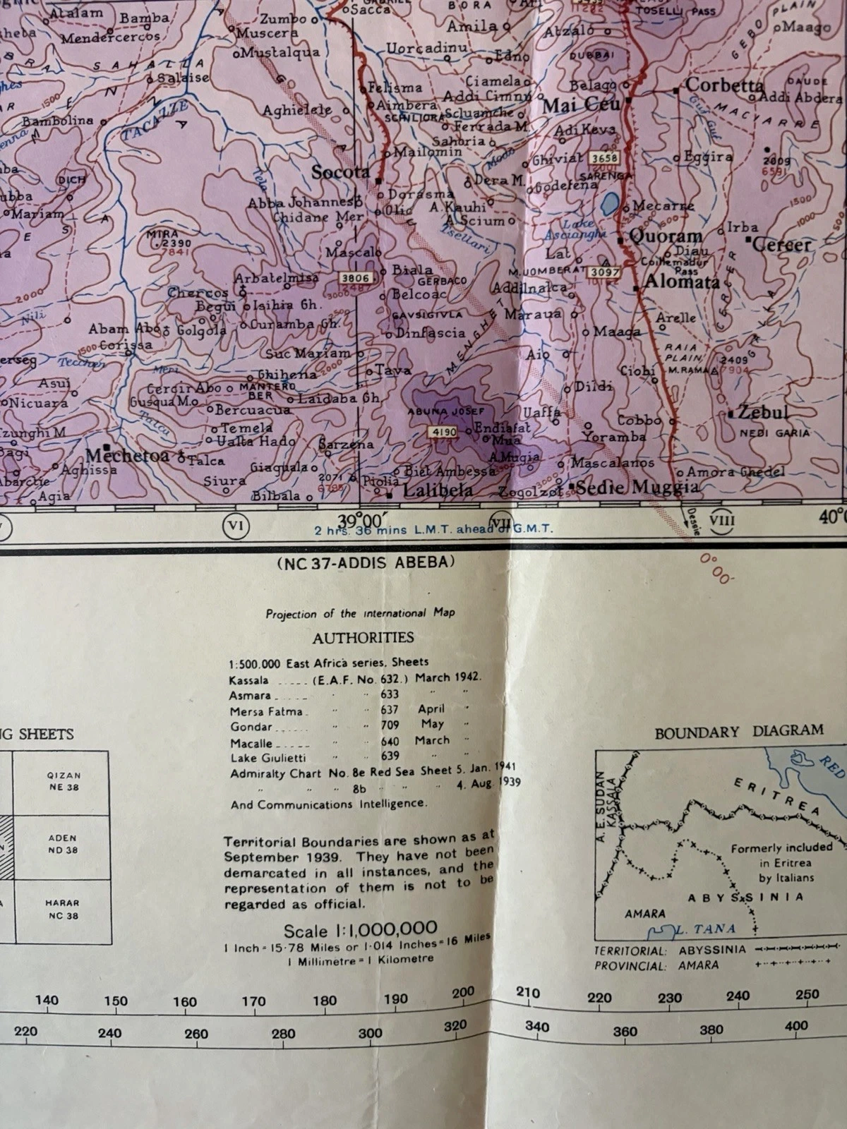 Asmara map margin listing survey sheets and Admiralty charts under Authorities, with scale and a boundary diagram beside it.