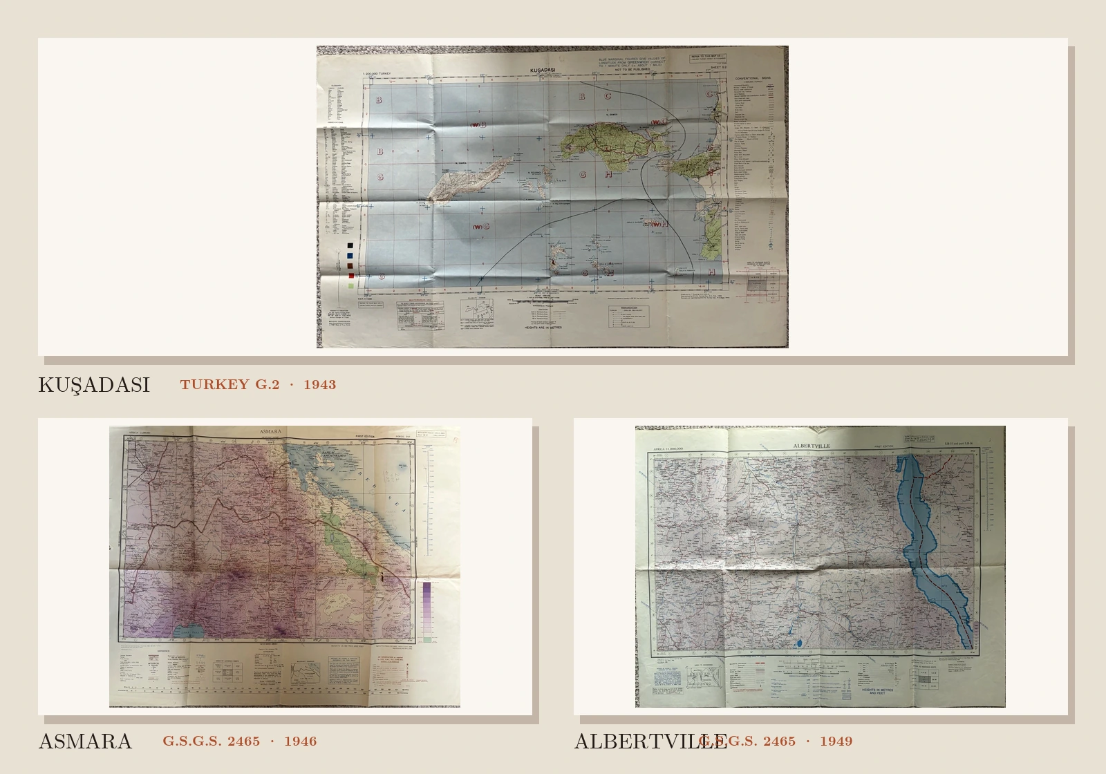 Three complete folded military maps mounted together and labelled Kuşadası Turkey G.2 1943, Asmara GSGS 2465 1946 and Albertville GSGS 2465 1949.