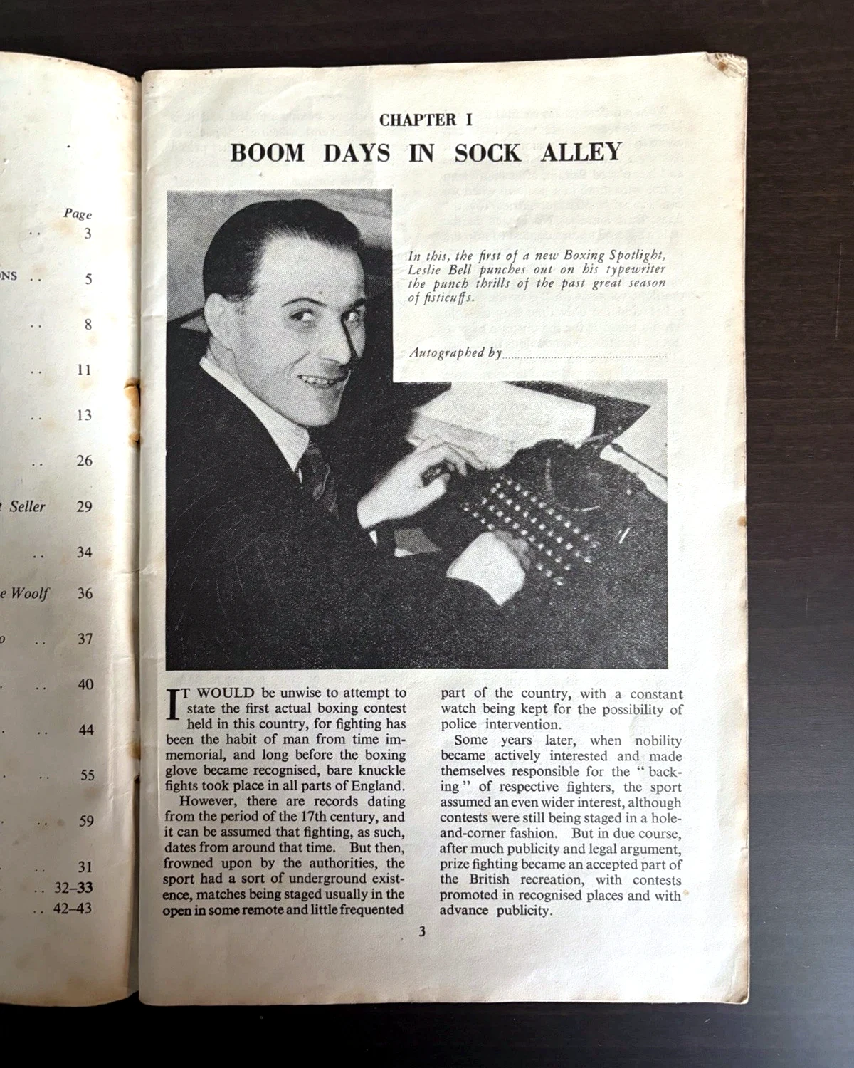 Opening page of Leslie Bell's Boxing Spotlight 1949, showing Bell at a typewriter and an unfilled printed autograph line